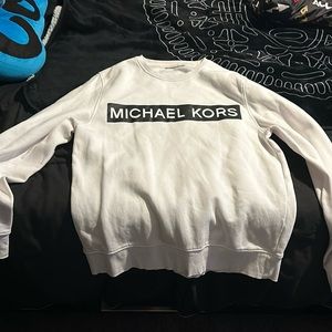 white MK sweater